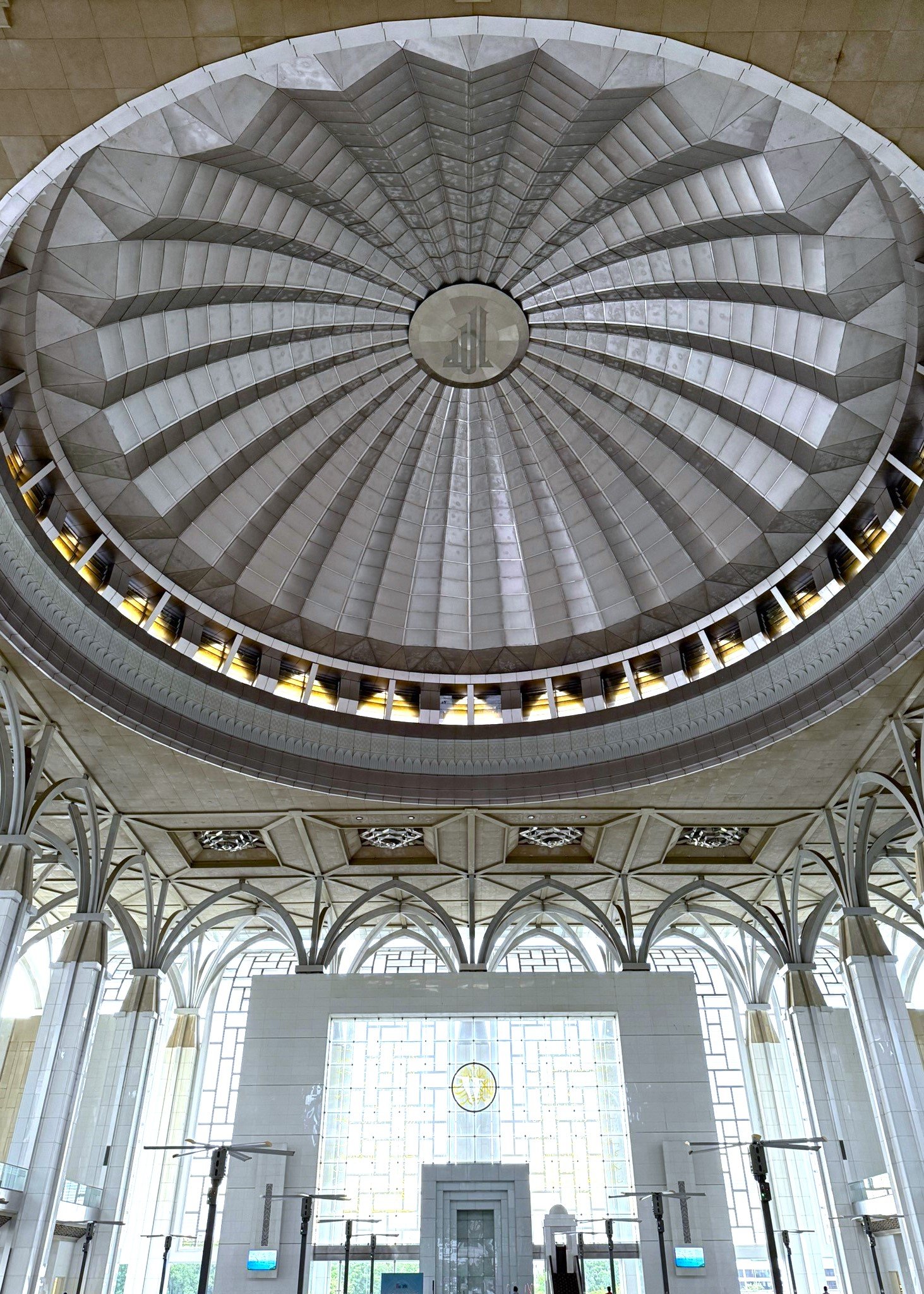 The Iron Mosque, officially Masjid Tuanku Mizan Zainal Abidin, is a modern architectural masterpiece in Putrajaya known for its stainless-steel structure and open-air design. Overlooking Putrajaya Lake, the mosque offers a cool, airy atmosphere, spacious prayer halls and stunning geometric details that reflect contemporary Islamic style. Muslim travellers can enjoy peaceful worship, explore the surrounding waterfront and walk to nearby landmarks including Putra Mosque and the Putrajaya bridges. Easily accessible from Kuala Lumpur by Grab or public transport, the Iron Mosque is an inspiring stop for culture, architecture and photography lovers.