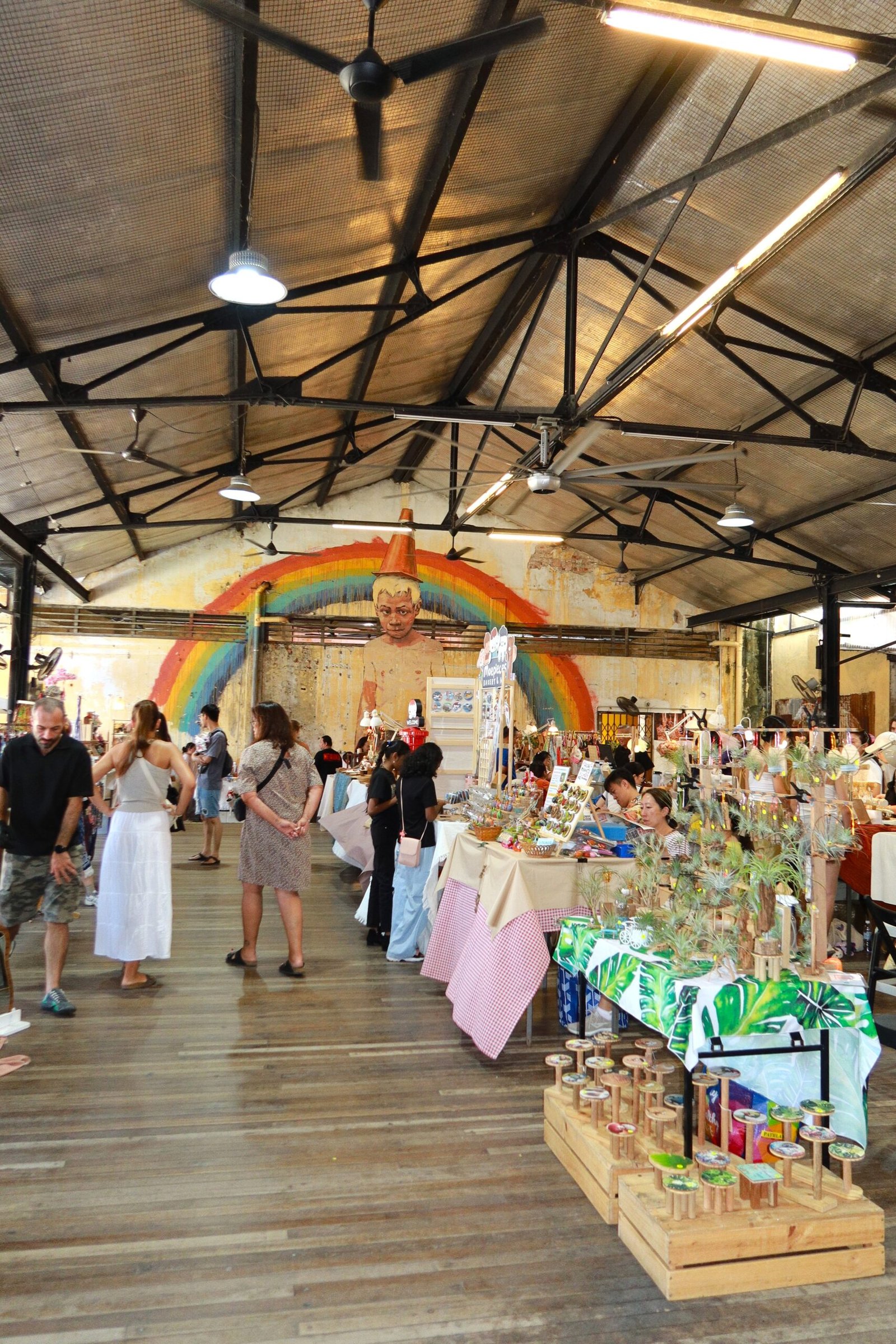 Hin Bus Depot in George Town is a vibrant creative hub housed in a former bus depot. Today, it features art exhibitions, murals, pop-up markets, cafés, and cultural events. It’s a popular weekend spot for visitors looking to explore Penang’s contemporary art scene, local designers, and relaxed café culture in a unique industrial setting.