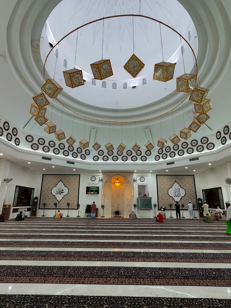 Masjid Al-Bukhary, located in Bandar Baru Sungai Pinang near George Town, is one of Penang’s most beautiful modern mosques. Built with inspiration from Middle Eastern architecture, it features a grand golden dome, elegant arches, and a spacious prayer hall. The mosque welcomes visitors outside prayer times and offers full facilities for worshippers. Its impressive design and peaceful surroundings make Masjid Al-Bukhary an important Islamic landmark in Penang.