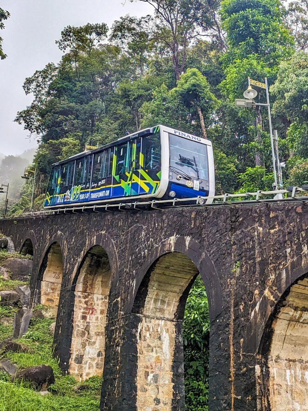 Penang Hill is one of the top attractions in George Town. Visitors take the famous funicular train up the hill to enjoy panoramic views over the island and mainland Malaysia. At the top, you’ll find cooler temperatures, rainforest walking trails, cafés, and scenic viewpoints. Penang Hill is a must-visit for nature lovers and anyone wanting the best skyline views of Penang.