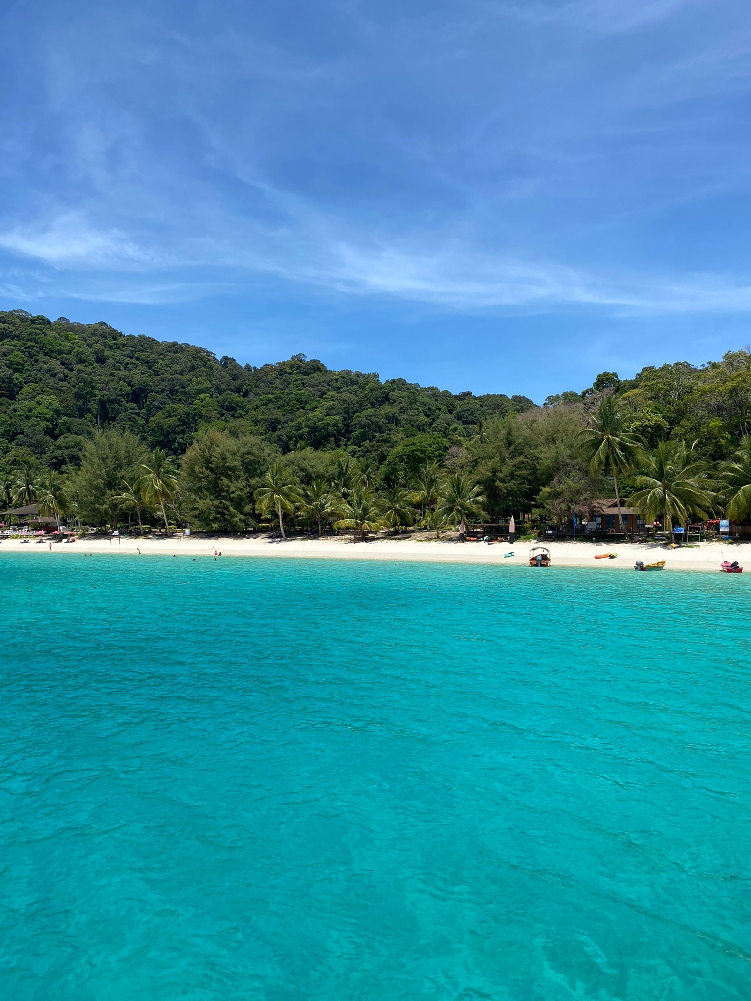 The Perhentian Islands are a tropical paradise off the northeast coast of Malaysia, known for crystal-clear waters, white sandy beaches, and vibrant coral reefs. The two main islands, Perhentian Kecil and Perhentian Besar, offer stunning snorkeling, diving, and relaxed beachfront stays. With halal food widely available and a laid-back island atmosphere, the Perhentian Islands are perfect for Muslim-friendly beach travel in Malaysia.