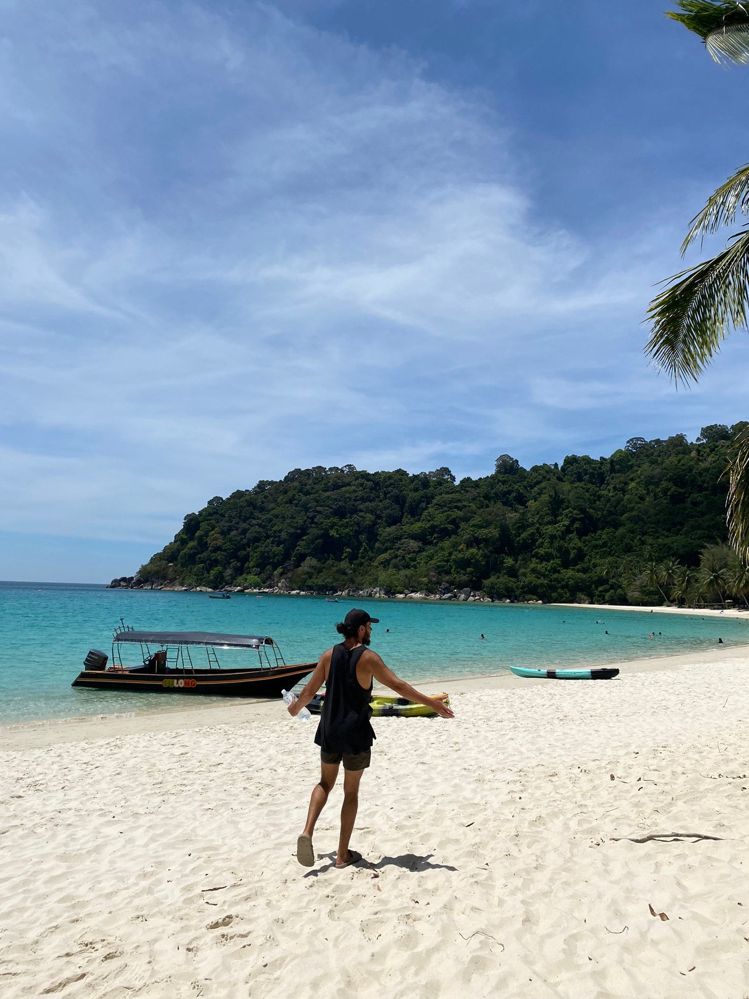 Island hopping in the Perhentian Islands is a popular boat tour that takes visitors to hidden beaches, snorkeling spots, and small surrounding islets. Tours usually depart from Perhentian Kecil or Perhentian Besar and include several stops for swimming and snorkeling. With crystal-clear waters, coral reefs, and chances to spot sea turtles, island hopping is one of the best things to do in the Perhentians for a full tropical experience.