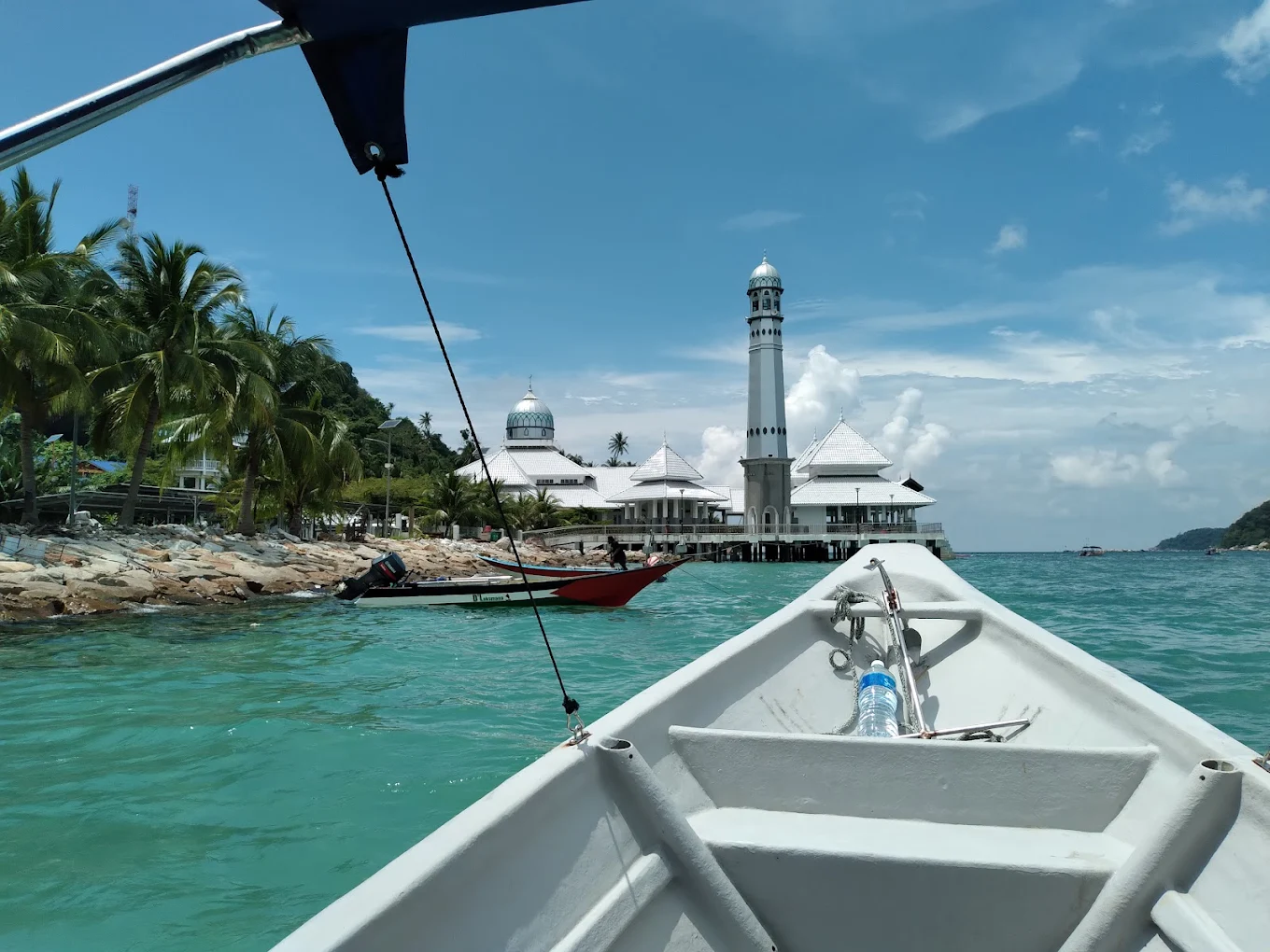 The Floating Mosque on Pulau Perhentian Kecil, officially known as Masjid Al‑Rahman Perhentian, is a small mosque built on pillars above the sea. It is located near the main jetty of the Perhentian Islands in Malaysia. The mosque is known for its peaceful setting and beautiful ocean views. Visitors often stop here to admire the architecture, take photos, or enjoy the calm atmosphere. For Muslim travelers, it is also an important place for daily prayers while visiting the Perhentian Islands.