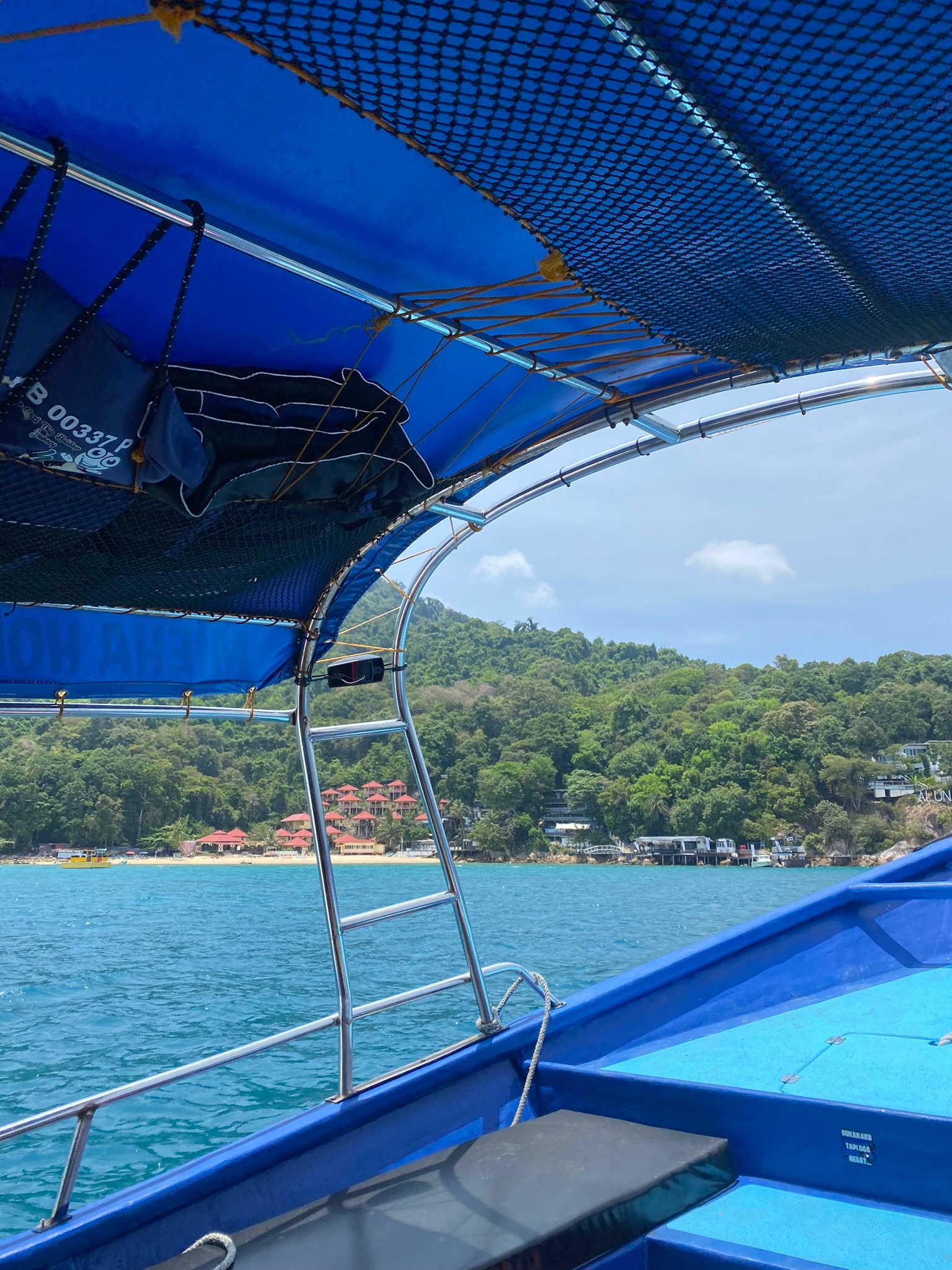 The Perhentian Islands are accessible by boat from Kuala Besut Jetty on the mainland. Speedboat transfers take about 30–45 minutes to reach Perhentian Kecil or Perhentian Besar. To get to Kuala Besut, travelers typically fly to Kota Bharu or Kuala Terengganu and continue by taxi or bus to the jetty. There are no cars on the islands; transport is by boat taxi or on foot, giving the Perhentians their peaceful, car-free atmosphere.